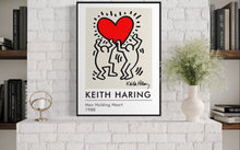 Load image into Gallery viewer, Men Holding Heart by Keith Haring, 1988
